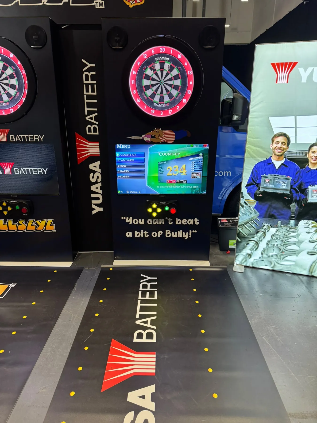 Auto scoring dart machine running a count-up game