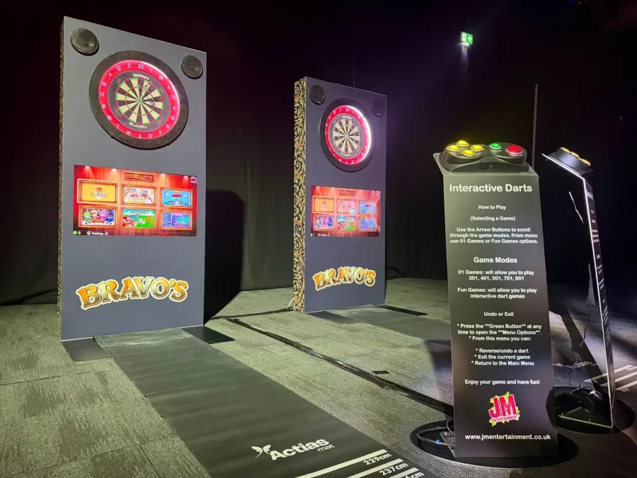 Interactive darts hire machines with screens and button consoles